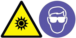 Yellow, purple, and white triangle and cicular caution signs