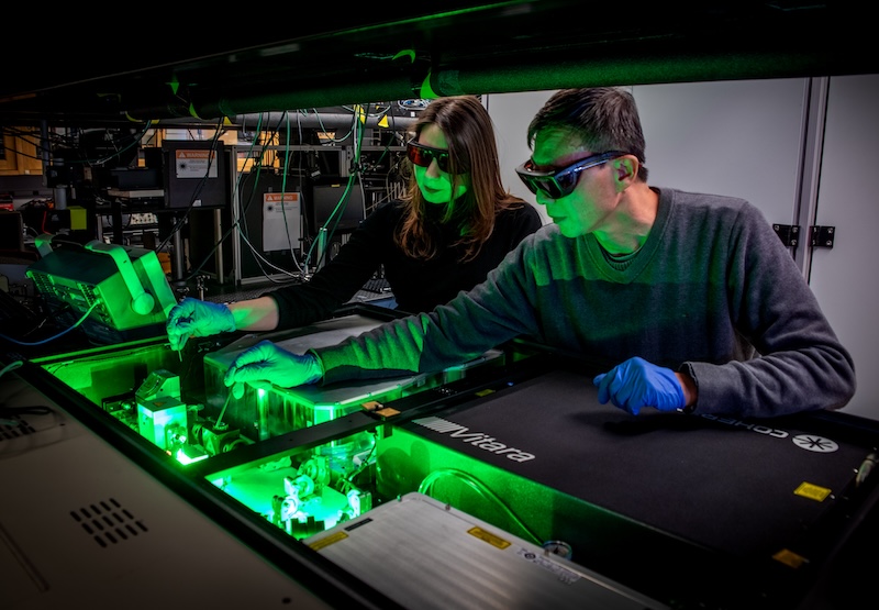 Vassilia Zorba (left), Physicist Research Scientist/Engineer, Laser Group Lead, works with Xianglei Mao, Physicist Research Scientist/Engineer, as they adjust the optics on the Ultrafast Laser in the Laser Technologies Group lab. 02/19/2020 – Berkeley, California
