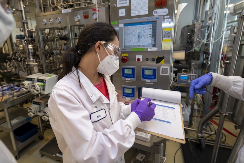 Alaina Anand, UC Berkeley, checks the instruments during the  UC Berkeley class "Advanced Bioprocess Engineering Laboratory" which introduces advanced concepts of bioprocessing to chemical engineering students at the Advanced Biofuels and Bioproducts Process Development Unit (ABPDU), Lawrence Berkeley National Laboratory in Emeryville, California, 03/31/2022.